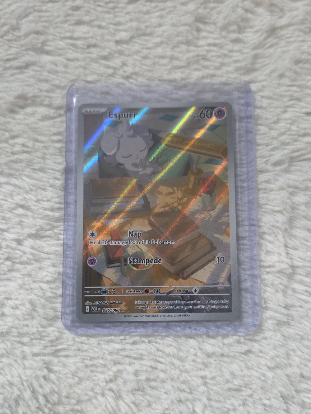 Espurr (095/088) Illustration Rare card from the ME03: Perfect Order set.
